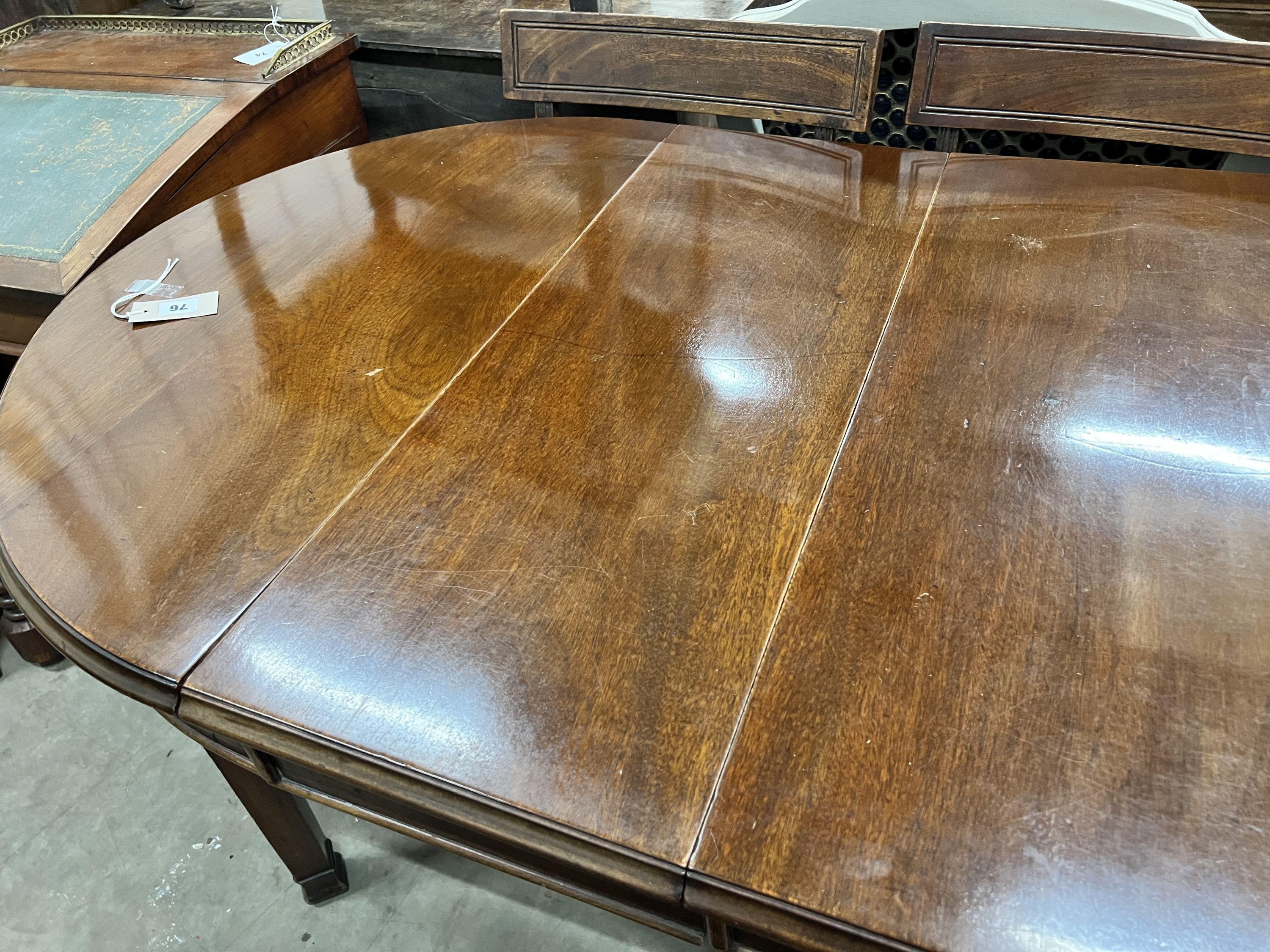 A late 19th century Georgian style D end extending dining table with extra leaves, on square tapering legs, length 140cm extended two spare leaves, width 83cm, height 77cm